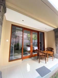 Posezení v ubytování Kope House Ubud