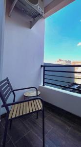 AJ BOUTIQUE HOTEL tesisinde bir balkon veya teras