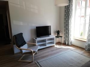 Sjónvarps- og/eða afþreyingartæki á Just Rest Automatic Hostel
