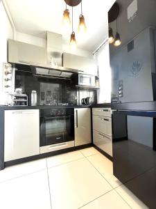Köök või kööginurk majutusasutuses INFLANCKA Apartment - Self Check-In 20h