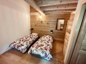 Letto o letti in una camera di Gîte Chalet La Vie Sauvage