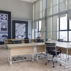 a conference room with tables and chairs and windows at Infinity Pool Scarletz Suites KLCC in Kuala Lumpur