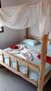 Postel nebo postele na pokoji v ubytování New Iddi Villa