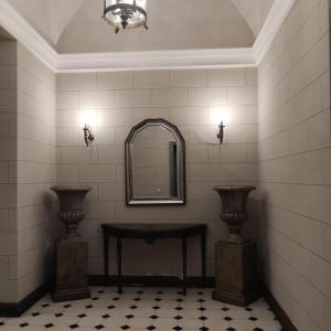 uma casa de banho com um espelho, uma mesa e vasos em Carlo's rooms em Trapani