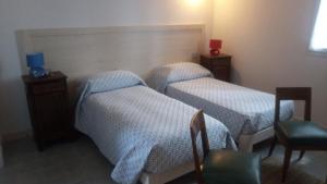 Postel nebo postele na pokoji v ubytování Bed & Breakfast DA BARTAI