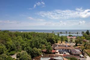 an aerial view of a house and the ocean at Serenity by Oxygen Residence in Neptun