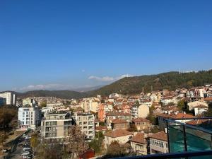 a view of a city from a building at Luxury Art 4 Apartment in Blagoevgrad