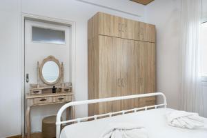 Posteľ alebo postele v izbe v ubytovaní Breeze One Bedroom Apartment by BluPine