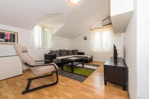 Posezení v ubytování Apartments Remini