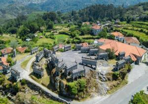 an aerial view of a house on a mountain at Casa da Carrasqueira in Soajo