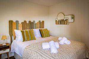 Lake District Woodland Pods - Winster, Bowness-on-Windermere客房内的一张或多张床位