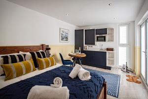 Lake District Woodland Pods - Winster, Bowness-on-Windermere客房内的一张或多张床位