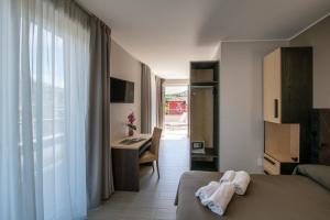 TV a/nebo společenská místnost v ubytování Hotel Boston