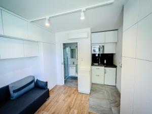 Kuchyňa alebo kuchynka v ubytovaní TPS Apartamenty Olimpijskie