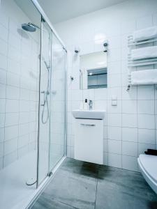 Kúpeľňa v ubytovaní TPS Apartamenty Olimpijskie