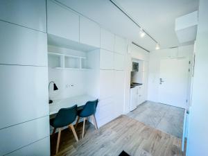Kuchyňa alebo kuchynka v ubytovaní TPS Apartamenty Olimpijskie