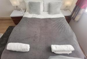 Postel nebo postele na pokoji v ubytování TravelMore