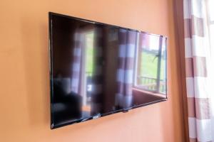 Televisor o centre d'entreteniment de Golden Palms Apartment