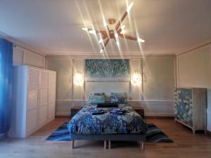 Gîte 4 étoiles dans le Jura - Lagoon客房内的一张或多张床位