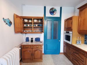 Gîte 4 étoiles dans le Jura - Lagoon的厨房或小厨房