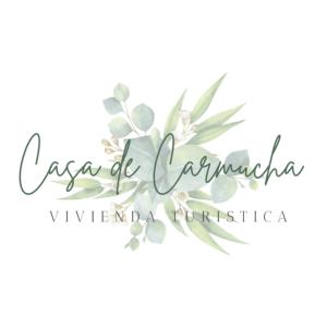 ein Blumenlogo mit dem Logo für einen Blumenladen in der Unterkunft Casa de Carmucha 3 dormitorios in Ordes