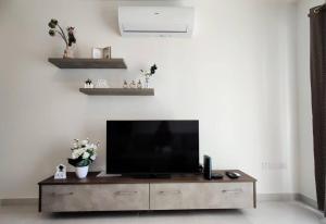 A television and/or entertainment centre at Lorenza Letting Two