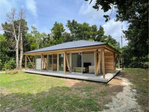 a modular home with a pitched roof at SHINMINKA Villa JANADO - Vacation STAY 66320v in Kumejima
