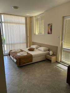 A bed or beds in a room at Villa Maria 2