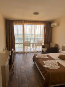 A bed or beds in a room at Villa Maria 2