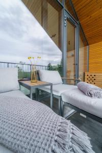 Balkón alebo terasa v ubytovaní Golden Apartments Mountain Aparts