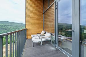 Balkón alebo terasa v ubytovaní Golden Apartments Mountain Aparts