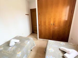Ein Bett oder Betten in einem Zimmer der Unterkunft Gemelos 22-3-12