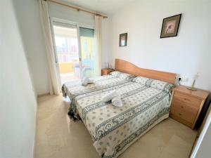 Ein Bett oder Betten in einem Zimmer der Unterkunft Gemelos 22-3-12