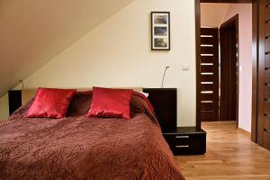 Posteľ alebo postele v izbe v ubytovaní Apartamenty Smile