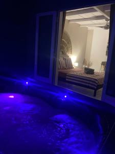 Llit o llits en una habitació de Ti Repos Martinique - maison avec Spa