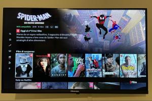 a tv screen with a bunch of movies on it at Rosaria's Home in Brindisi