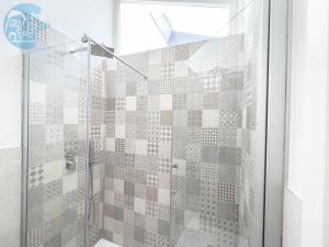 Koupelna v ubytování Slataper 19 Tirabora Short Rent + 19 fotografií