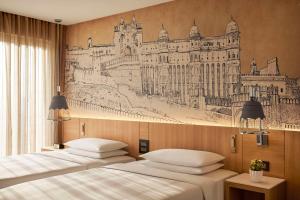 Postel nebo postele na pokoji v ubytování Hyatt Place Jaipur Malviya Nagar