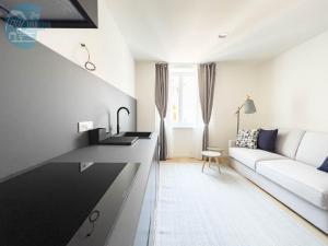 TV a/nebo společenská místnost v ubytování Slataper 19 Tirabora Short Rent