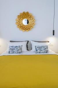 A bed or beds in a room at Alko Apartments