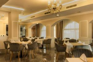 Vemara City Apart Hotel tesisinde bir restoran veya yemek mekanı