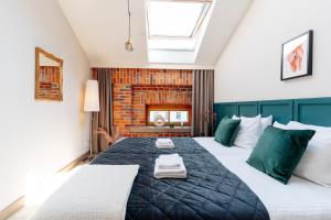 Katil atau katil-katil dalam bilik di Penthouse Stradom by LoftAffair