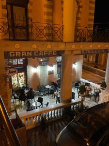 a view of a restaurant with tables and chairs at Casa Bucciarelle in Casoli
