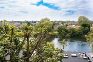 a view of a river in a city at NOX Richmond in Richmond