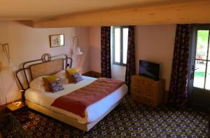 Postel nebo postele na pokoji v ubytování Le petit hotel