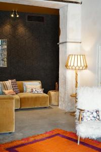 Posezení v ubytování Le petit hotel