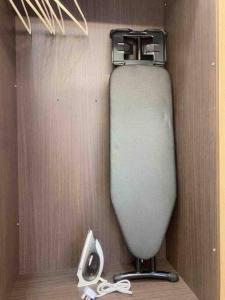 a white toilet in a room with a wall at Stylish Cozy House Near Ipoh Lost World Tambun in Kampong Batu Lapan +25 photos