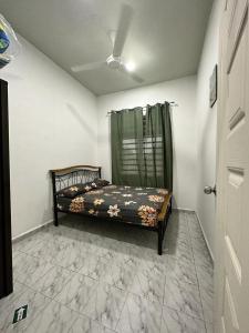 Katil atau katil-katil dalam bilik di Sara Homestay 1 & Sara Homestay 2