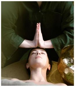 a woman with her hands on top of her head at Kerpė Hotel & SPA in Palanga