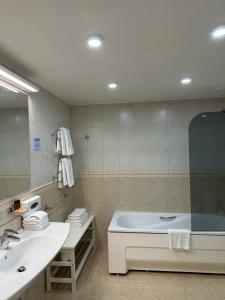 Vonios kambarys apgyvendinimo įstaigoje Alka Boutique Apartments & SPA